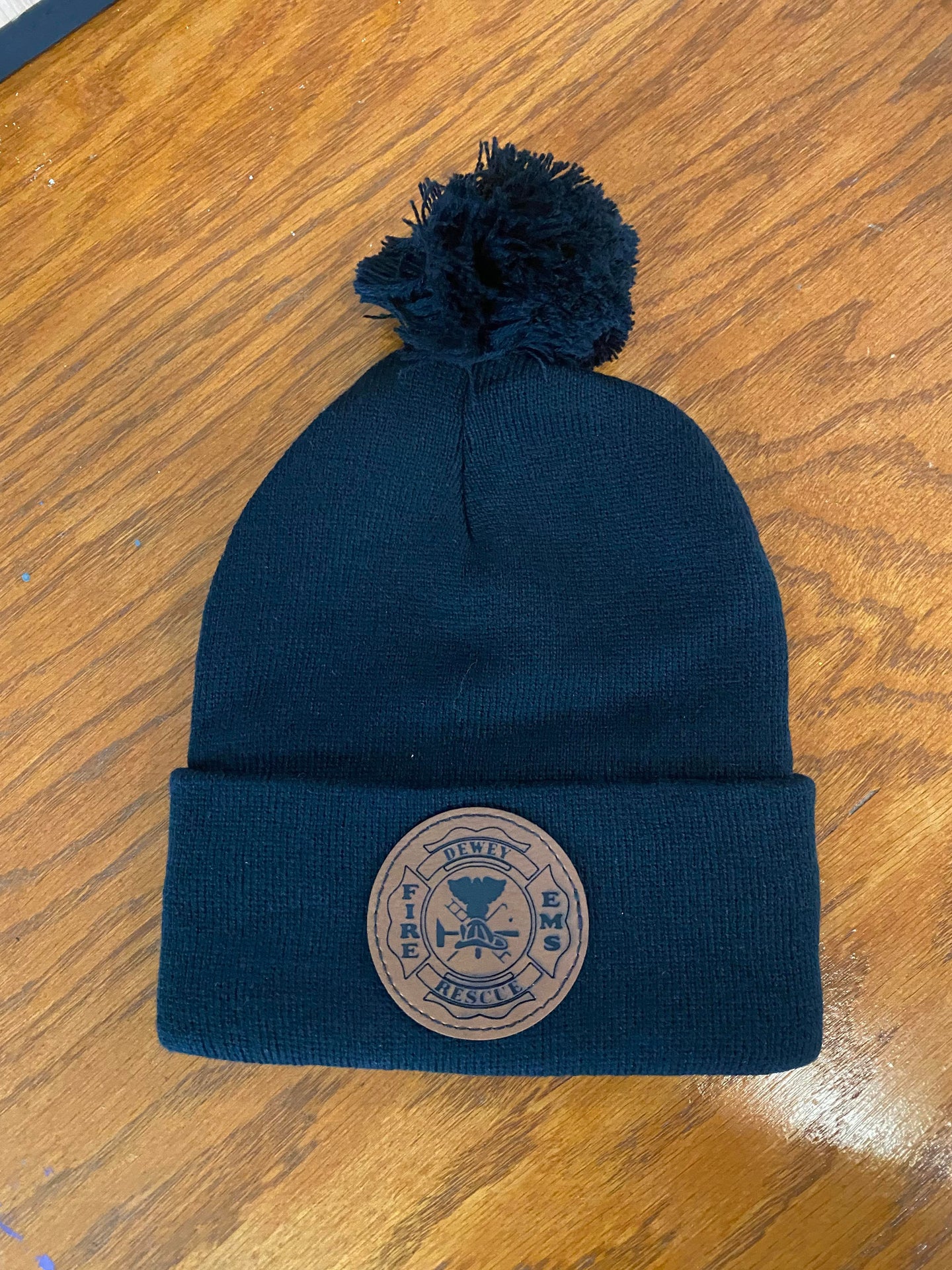 Dewey FD Beanie Pom Pom Hat with Leather Patch